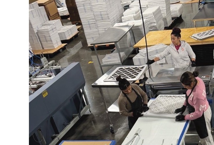 Advantage Filter MFG production floor with workers assembling HVAC filters
